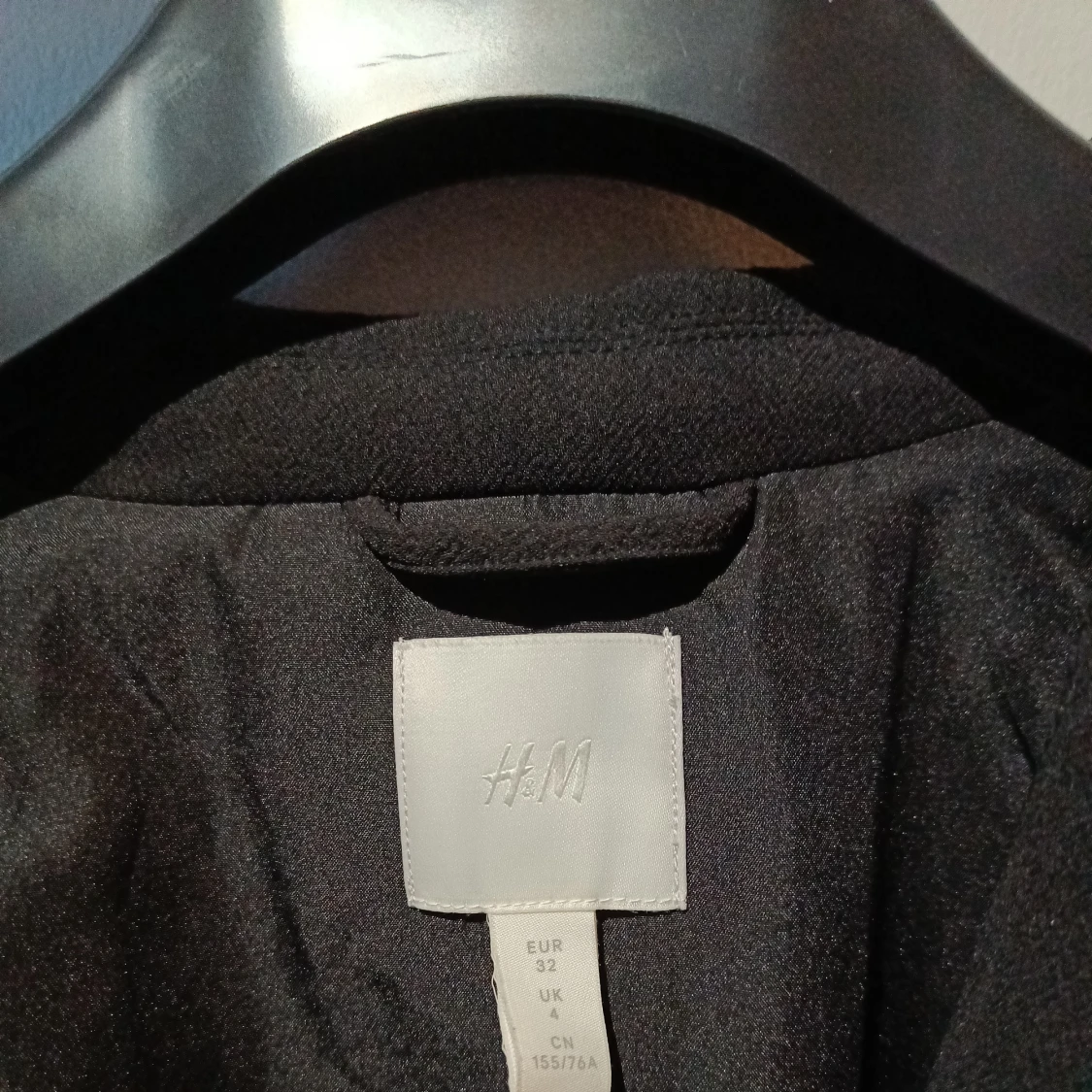 Svart kavaj i storlek 32 - 91