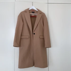 Beige kappa - Supersnygg beige kappa!! 