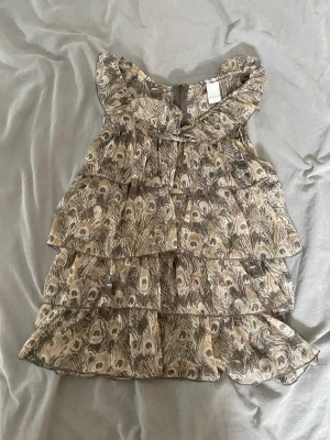 Volangblus - Volangblus utan armar från vila 