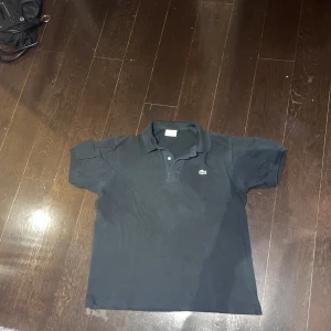 Lacoste Piké - Sparsamt använd. Nypris 1399 kr. Pris kan diskuteras