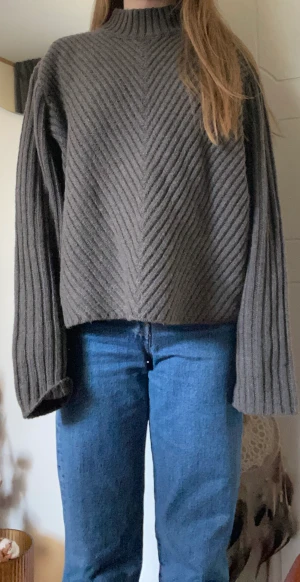 Stickad tröja  - Stickad tröja med ullblabdning från NAKD Säljer då jag inte använt mer en än gång 