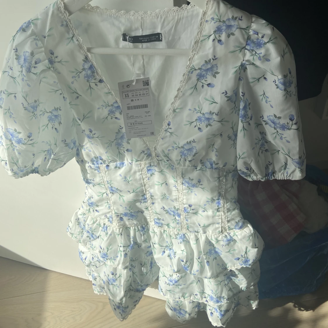 Blommig klänning - 90