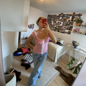 Korsettopp - Snygg korsettliknande topp i rutigt.