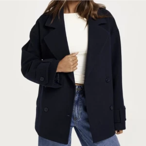 Blå kappa - Storlek xs från nelly