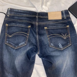 Lågmidjade bootcut jeans - Lågmidjade bootcut jeans