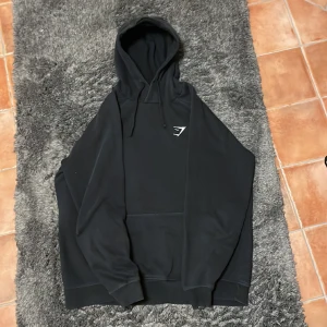 Gymshark hoodie - Gymshark hoodie i storlek L men den är liten i storleken så passar M också.