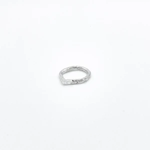 Stone ring edged in silver 925 - Each ring showcases a unique stone texture and form crafted from handpicked stones found in the Swedish woodlands.  Made to order, all sizes available   Made of Sterling silver 925  Handmade in Stockholm, Sweden