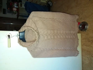 Poncho  - Handstickad poncho i glittergarn och flätor med hög krage