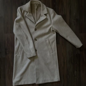 Kappa - Beige kappa från H&M