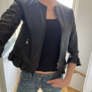 Jacka - Trekvarts skinnjacka/kofta