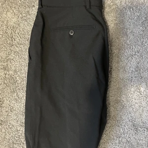 Kostymbyxor - Bläck kostymbyxor strl 46, bra skick!