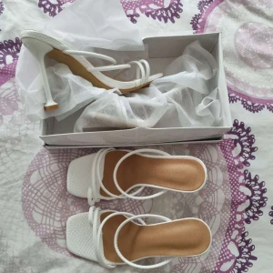 Vita klackar storlek 38  - Råkat köpa 2 par av samma storlek. Helt oanvända. Bekväma och jätte söta till sommaren <3