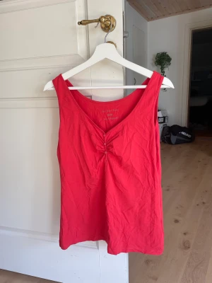 Linne med knappar  - Linne med knappar från Kappahl, korallrosa