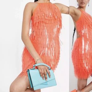 Paljettklänning - Aldrig använd, från asos med orange avlånga paljetter  Nypris 1500 kr