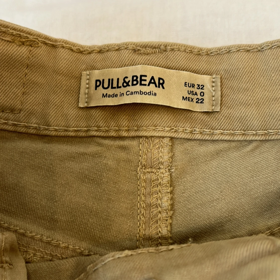 Beiga utsvänga Jeans - 90