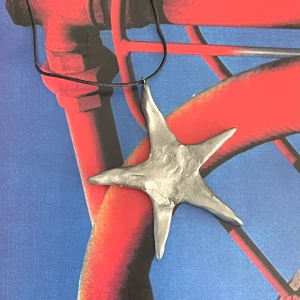 Halsband stjärna - Stjärnhalsband gjort av lera. 