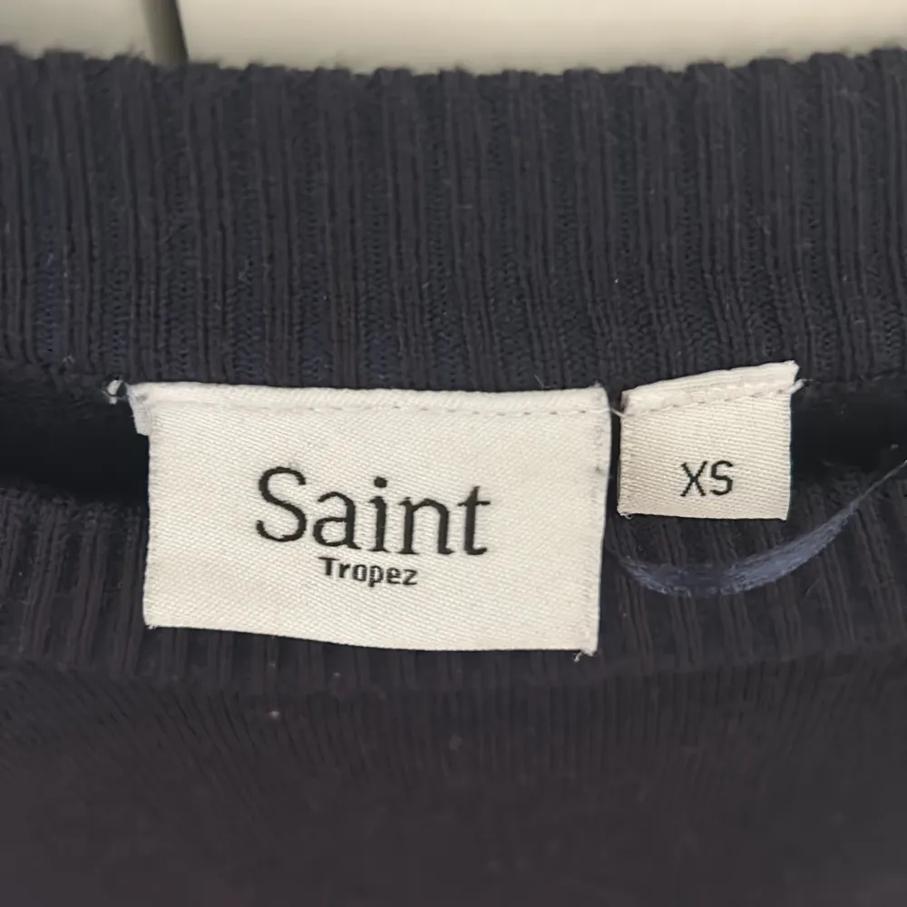 Säljer den här fina långärmade tröjan från Saint tropez i storlek XS!. Toppar.