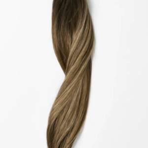 Clip in ponytail från rapunzel. 40cm. Fin brun nyans med blonda slingor. 