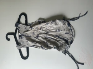 Linne - Linne med snördetaljer på sidorna