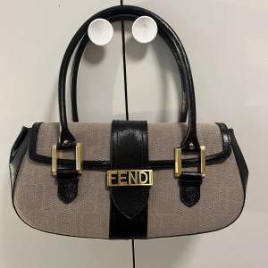 Fendi vintage baguette bag, bought in 2005 by my mom in Rome! Used twice, it doesn’t have a scratch. As new, it still has the label!! Impossible to find, really rare vintage. 