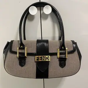 Fendi vintage baguette bag, bought in 2005 by my mom in Rome! Used twice, it doesn’t have a scratch. As new, it still has the label!! Impossible to find, really rare vintage. 