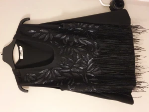 Snygg part topp med fransar - Snygg topp till fest med fransar. Strl s