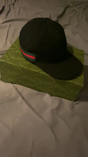 Gucci keps strlk M -  Gucci keps äkta såklart storlek M