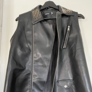 skinnväst - köparen står för frakten:)