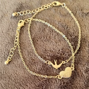 Armbandsset - 2 par armband. Silverpläterade och oanvända. Reglerbar längd.