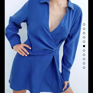 Skjort klänning  - Väldigt lent material inte som en skjorta 