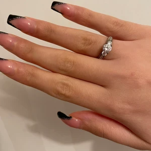 Ring  - Doppad i guld/ silver. Pris 129kr storlek L. 925 står det på ringen 