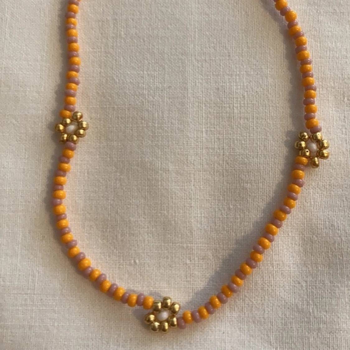 Halsband blommor - 90