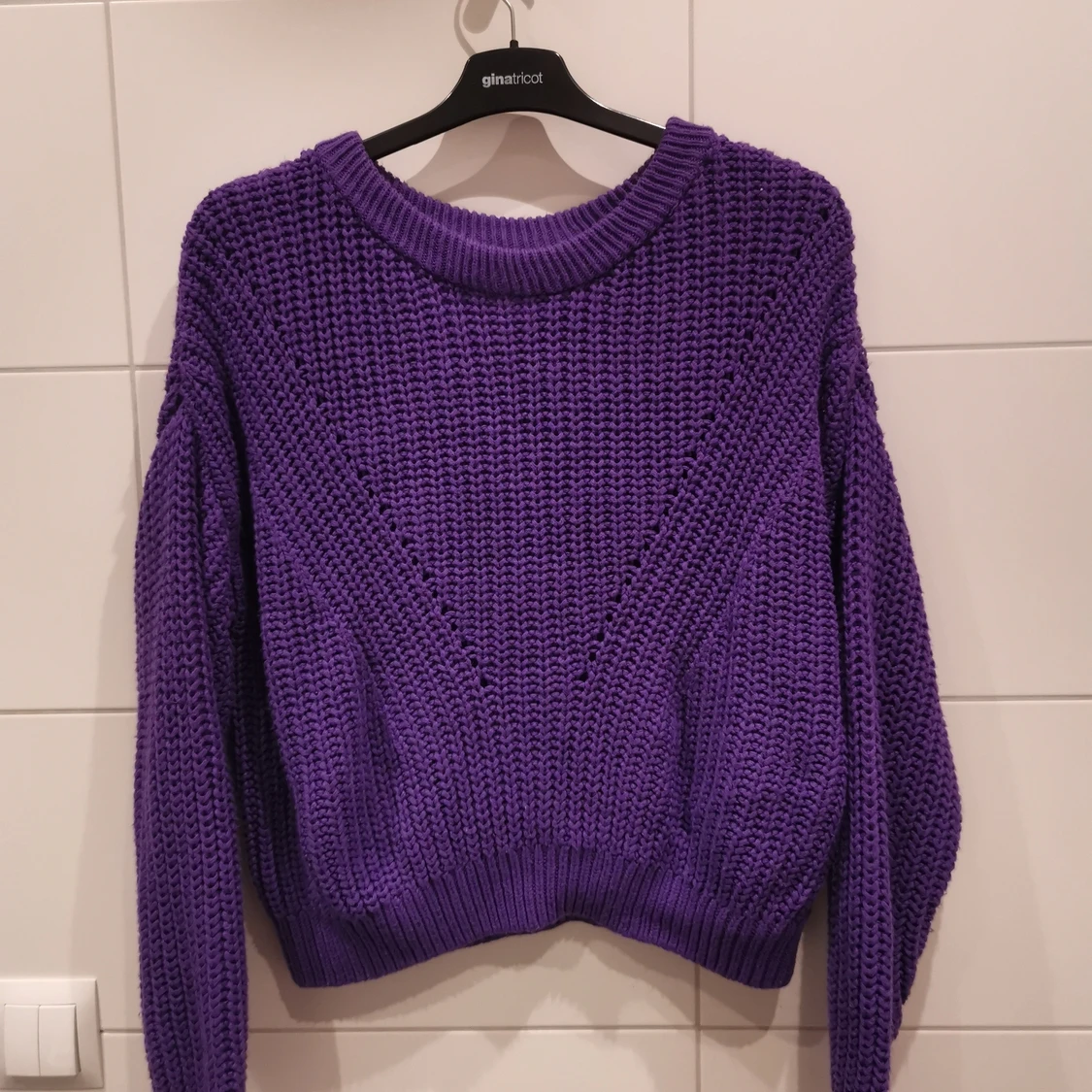 Lila stickadtröja