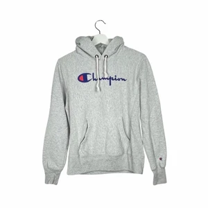 Champion Hoodie - Klassisk Champion hoodie i sträv, tålig bomullskvalité. Regular fit.