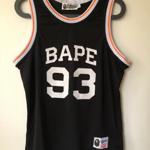 Bape Classic ‘93 Retro Tank Top Jersey - Bape / A Bathing Ape ‘93 Retro Tank Top Jersey  Size medium, fits like a regular men’s size medium.  Excellent condition, no flaws or damage.  DM if you need exact size measurements.   Buyer pays for all shipping costs. All items sent with tracking number.   No swaps, no trades, no offers. 