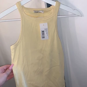 Oanvänt linne  - Oanvänt med lappen kvar