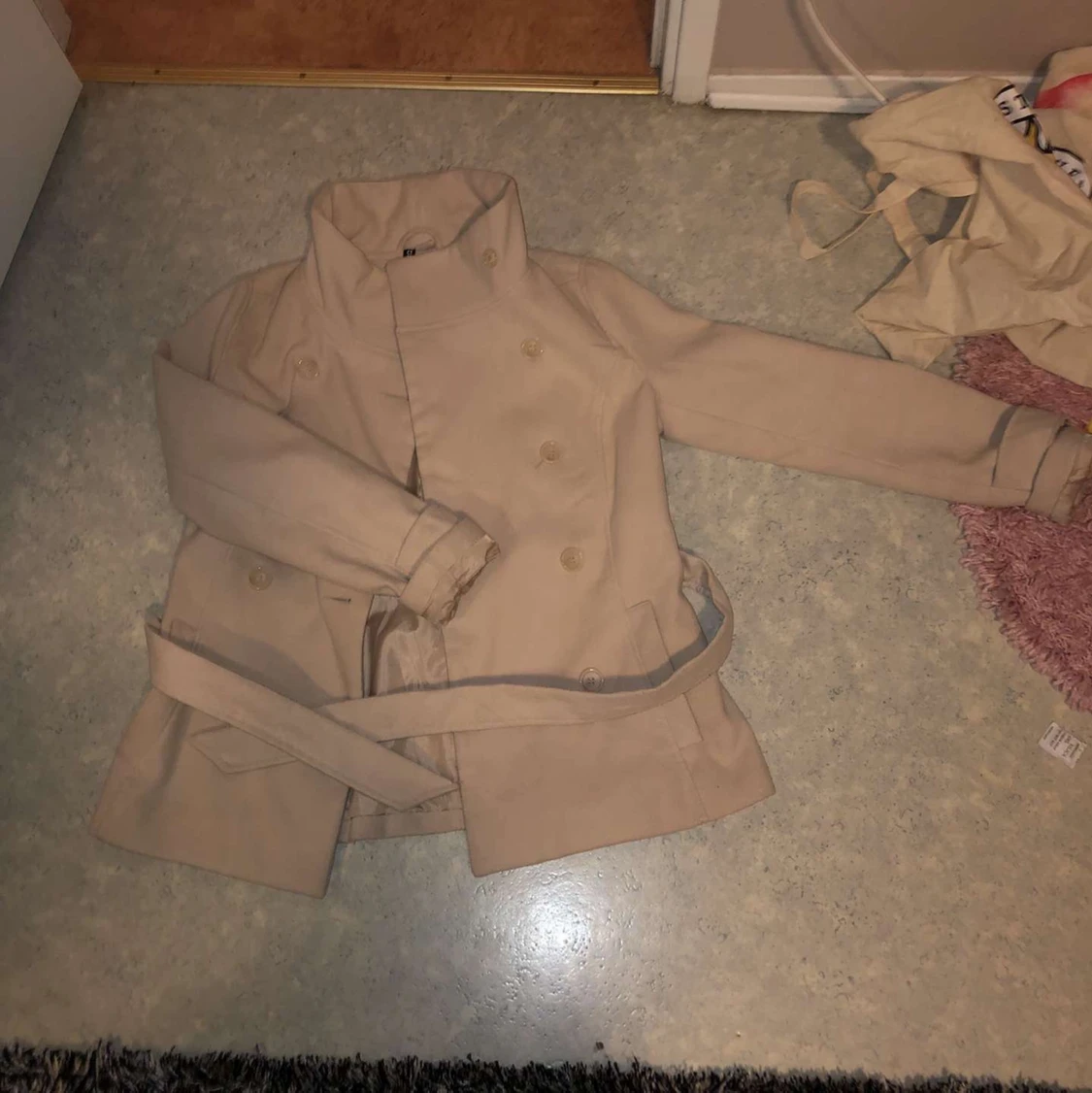 Oanvänd kappa från H&M