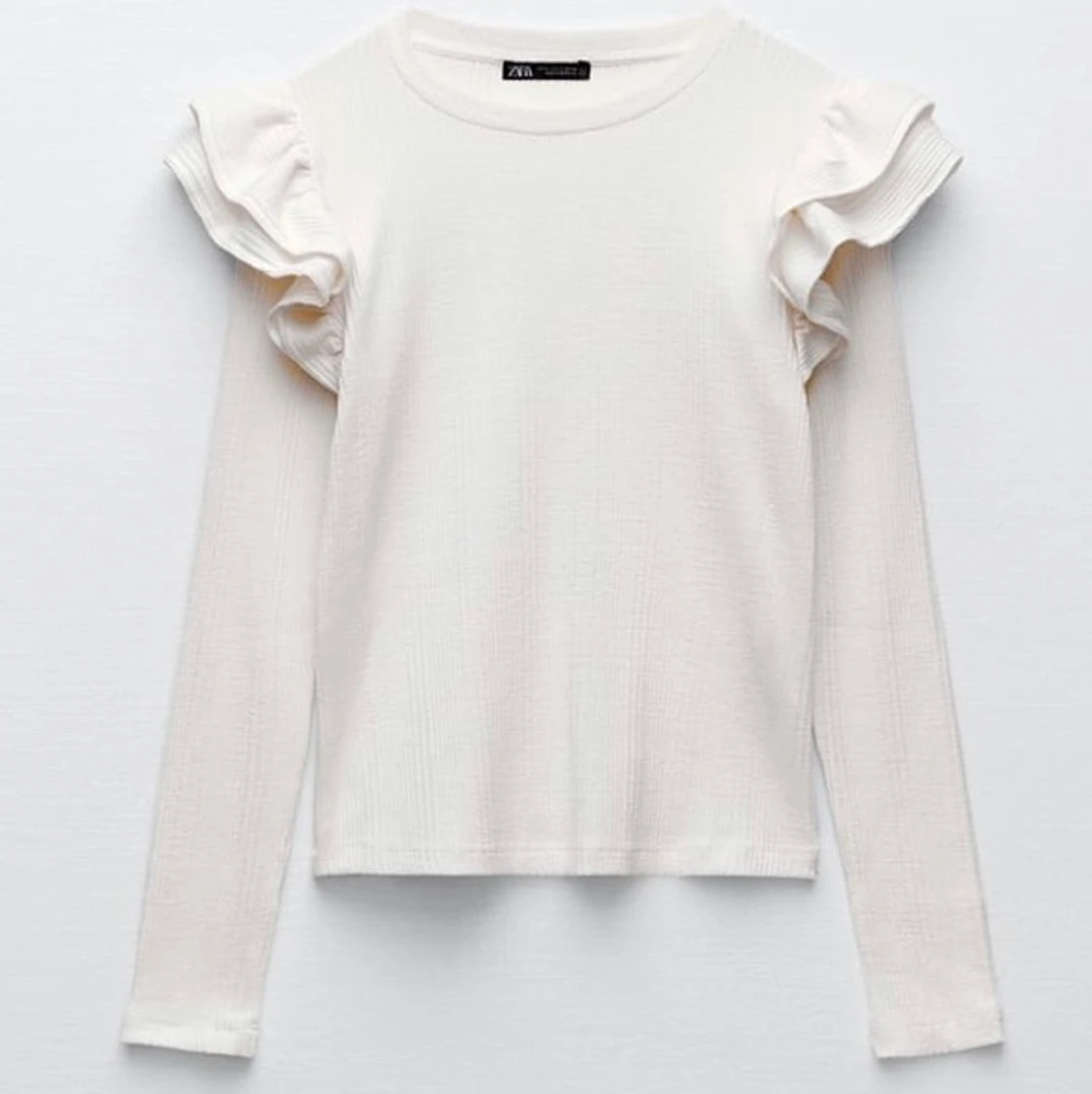Vit zara tröja med volanger