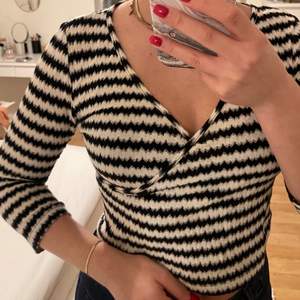 Black and white top in size small. Perfect condition 