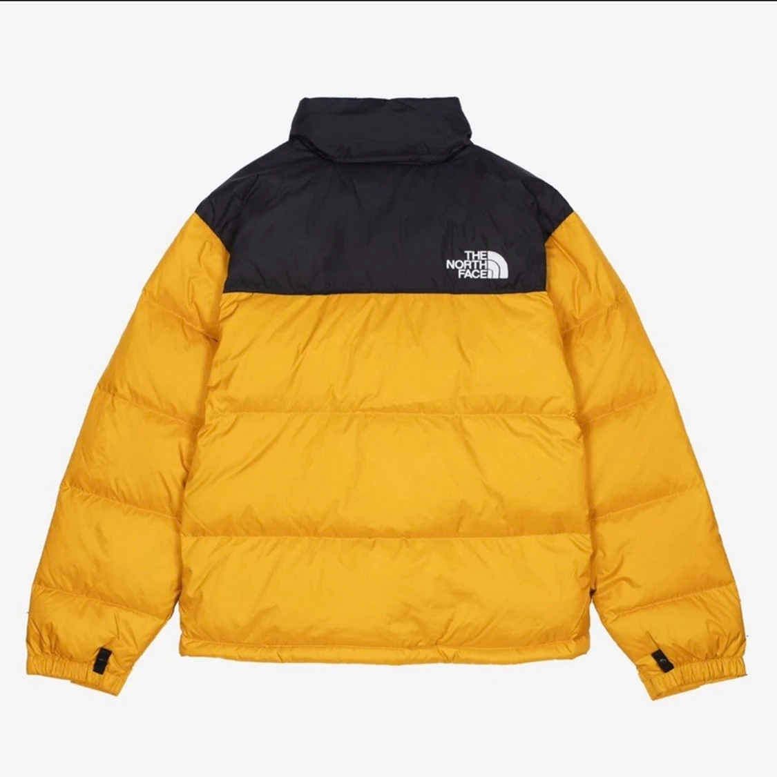 North face retro nuptse jacka gul.  - 90