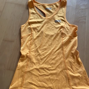 Träningslinne - Orange , xs, använd 1 gång