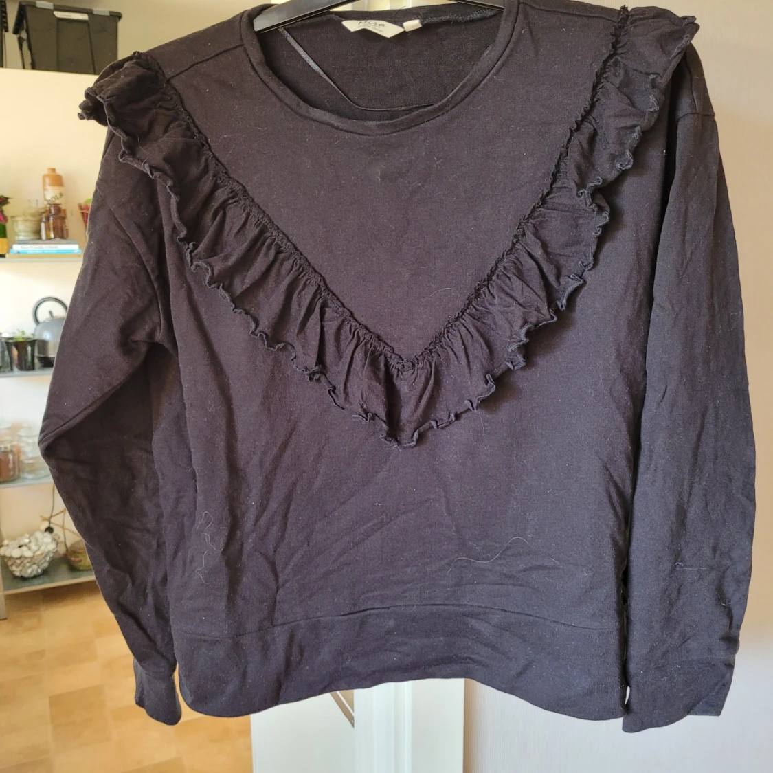 Sweatshirt med volang