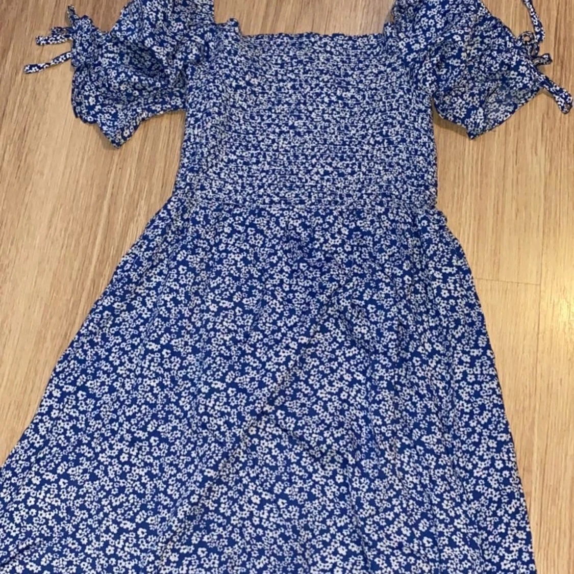 En fin blå klänning i storlek M