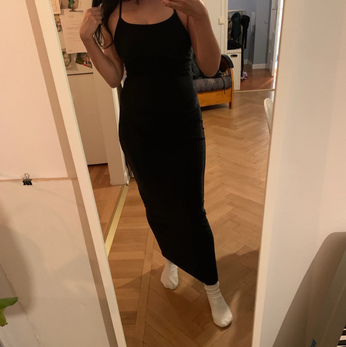 Skimrande tajt långklänning