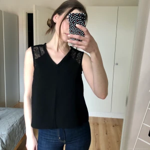 Kort svart blus, XS - Kort svart blus, XS