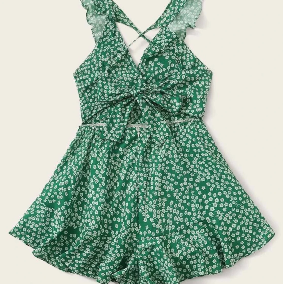 Grön jumpsuit med vita blommor  - 91