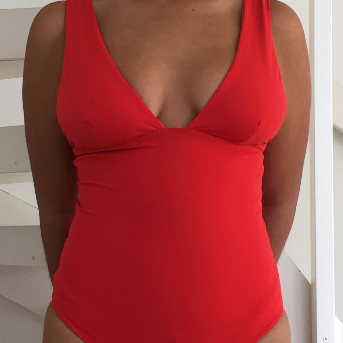 Röd och gul baddräkt 