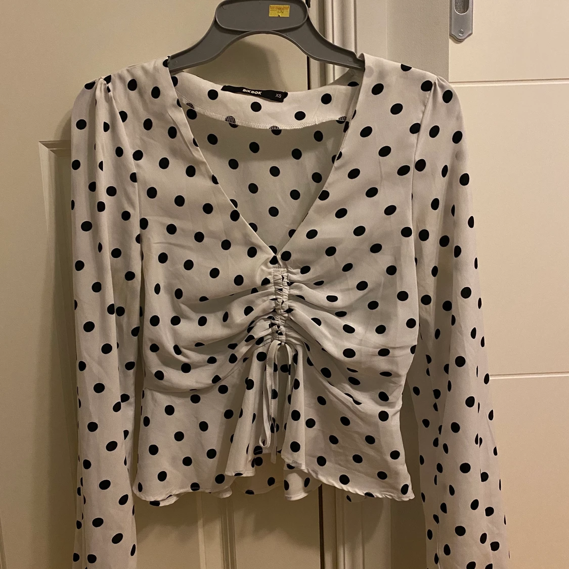 Prickig topp i storlek XS - 90