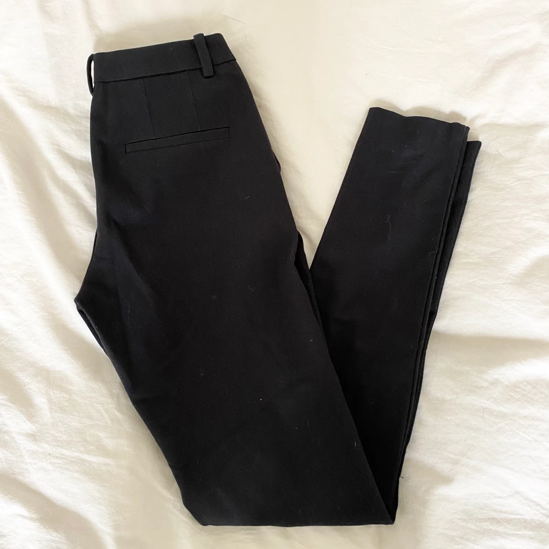 Svarta kostymbyxor
