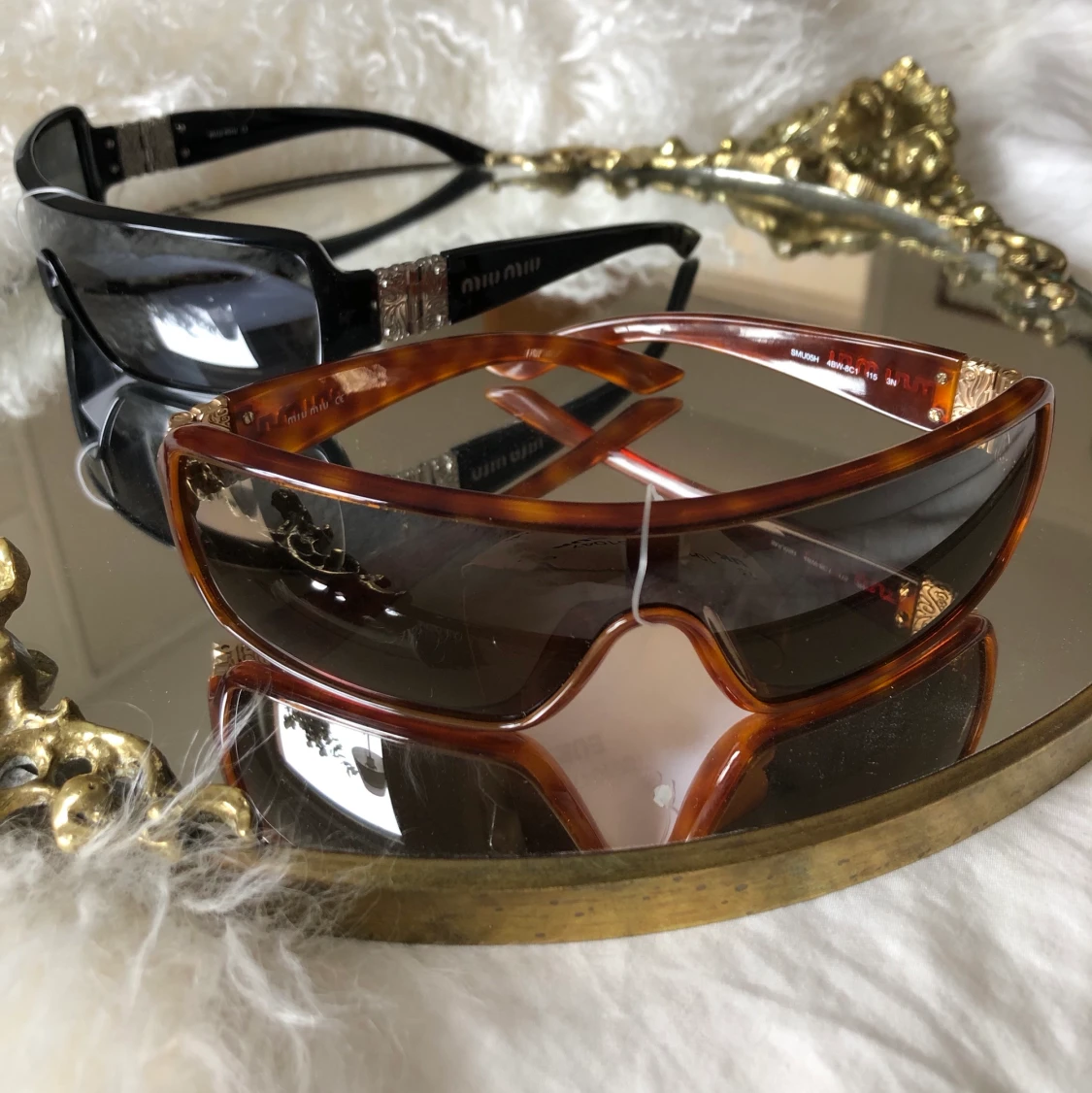 Prada Miumiu solglasögon